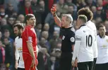 Steven Gerrard is shown a red card almost immediately after coming on ___.webp