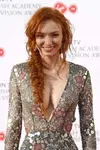 Eleanor-Tomlinson-hot-cleavage-pics.webp