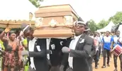 dancing-funeral-meme-1024x512-1-880x512.webp