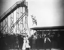 Spectators watch a horse diving act - 4 July 1905  .webp