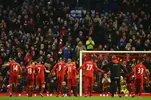 Jurgen-Klopp-manager-of-Liverpool-and-player-salute-The-Kop-after-the-Barclays-Premier-League...webp