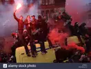 fans-on-top-of-a-police-van-and-flares-being-let-off-before-the-uefa-champions-league-semi-fin...jpg