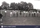 1940s-historical-group-of-men-of-different-ages-and-dressed-in-normal-KC2FW5.webp