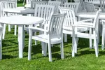 white-plastic-garden-furniture-on-a-lawn-D9C4TP.webp