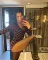 Dua-Lipa-Leggy-in-Boots-thefappeningblog.com_.webp