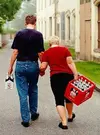 Couple-With-Beer-Crate-Funny-Image.webp