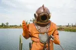 diver-immerses-copper-old-vintage-260nw-1646829493.jpg