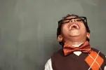 young-boy-laughing.webp