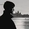 Johnnydawg_young_man_looking_at_the_city_of_liverpool_from_acro_17e25b87-bf39-42c7-9396-d9ea0...webp