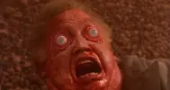 Cohaagens-Eyeballs-Bulging-in-Total-Recall-570x303.webp