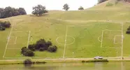 footy_pitch_on_the_side_of_a_hill.webp
