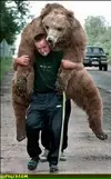Funny_Photo_Grizzly_on_back.webp