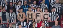 newcastle-united-fans-topless.webp