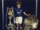 0_Steven-Gerrard-as-a-young-boy-wearing-an-Everton-kit.webp